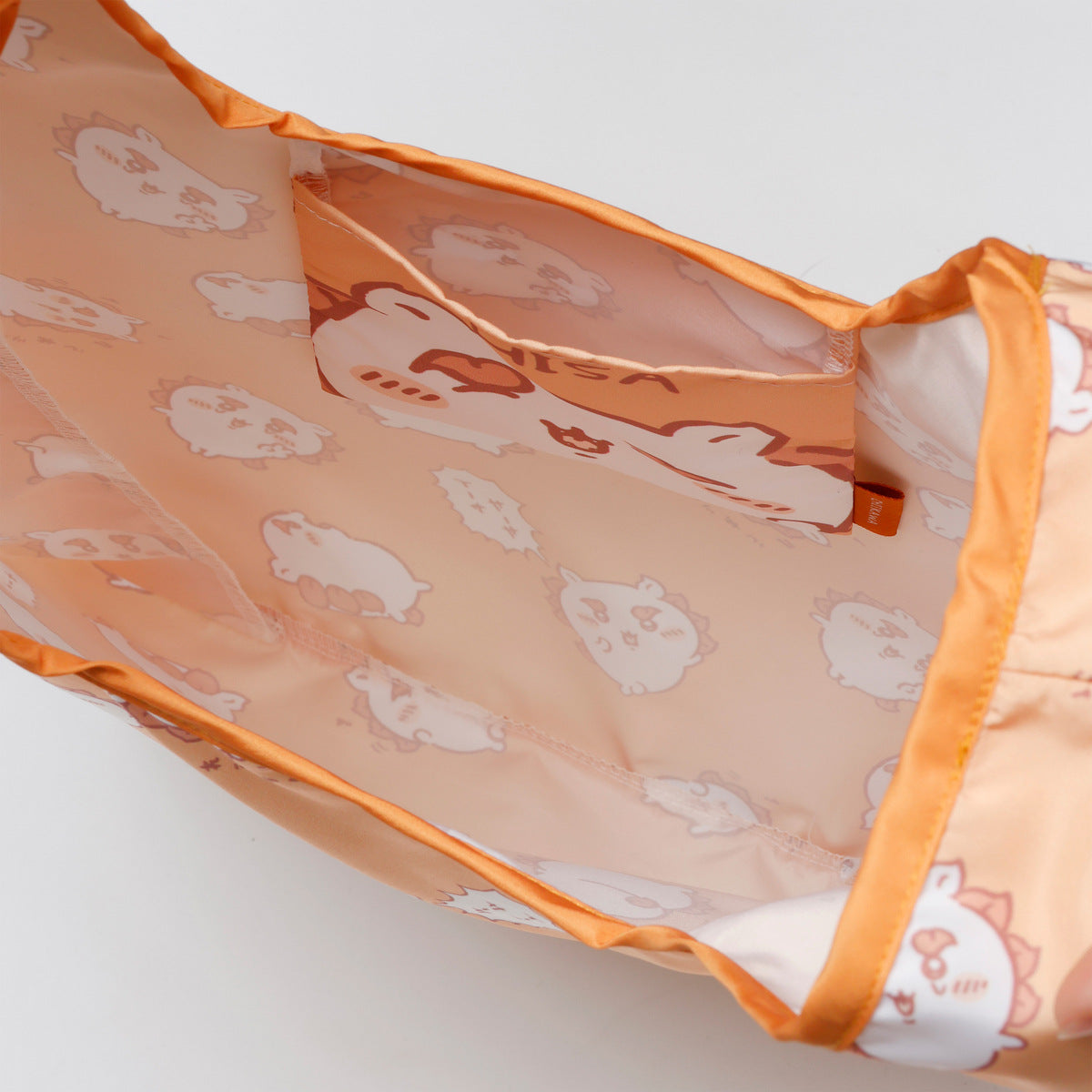ちいかわ エコバッグ シーサー総柄 オレンジ | ちいかわマーケット